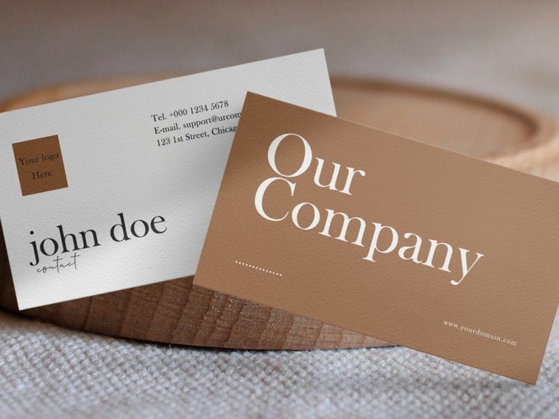 Clean minimal business card mockup with wood small plate on table and light shadow. PSD file.